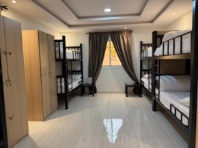 Urban Bunks Hostel - سرير في غرفة مشتركة